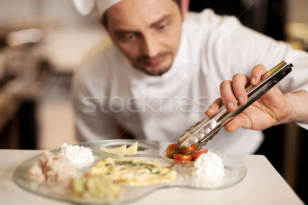 Befejezés nyami étel szakács szeletek paradicsomok Stock fotó © stockyimages