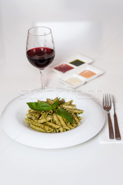 Yummy pasta served with red wine Stock photo © stockyimages