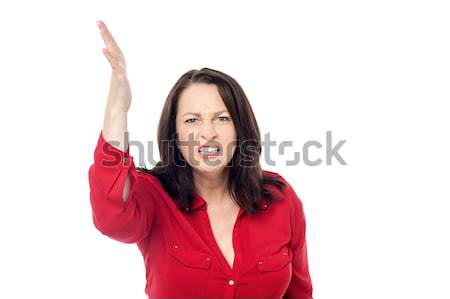 Upset woman isolated over a white  Stock photo © stockyimages