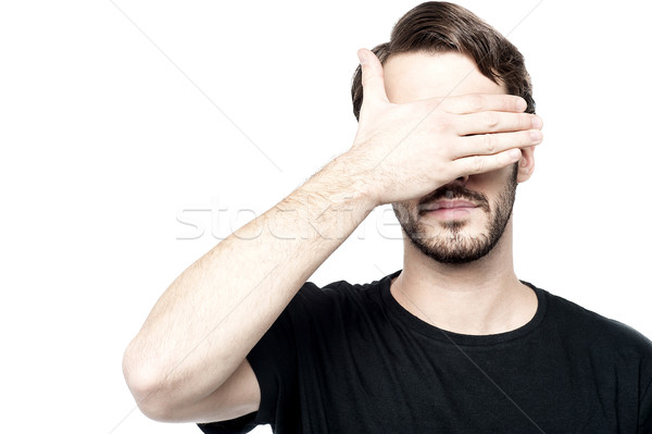 Man making see no evil gesture Stock photo © stockyimages