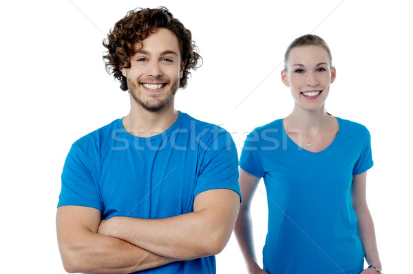 Smiling young couple in casuals Stock photo © stockyimages