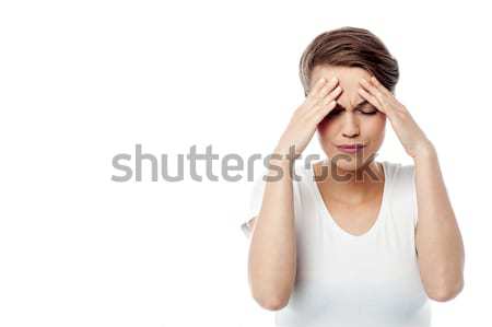 Feeling awful, I am having headache. Stock photo © stockyimages