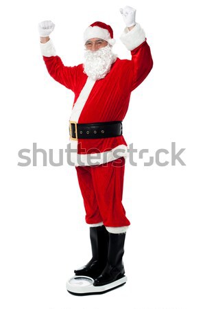 Santa sheds precious pounds! Stock photo © stockyimages