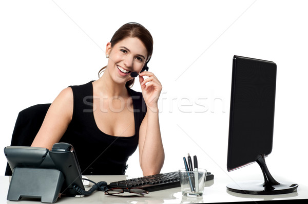 Női igazgató ügyfél hívás fiatal csinos Stock fotó © stockyimages