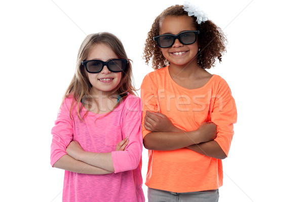 Two little girls in black sunglasses Stock photo © stockyimages