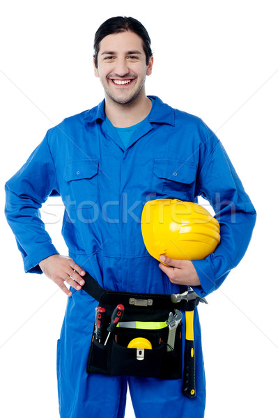 Young construction worker posing confidently Stock photo © stockyimages