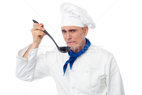 Chef terribile alimentare giovani maschio mangiare Foto d'archivio © stockyimages