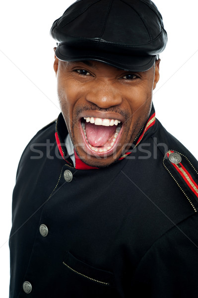 Shouting african man wearing cap Stock photo © stockyimages