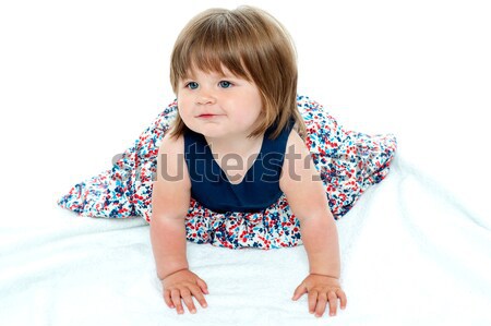 Adorable 10 months old baby girl crawling Stock photo © stockyimages