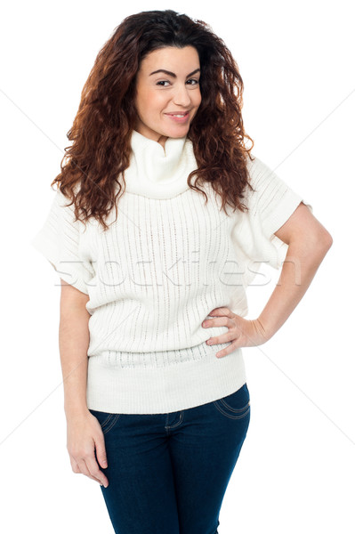 Trendy woman striking stylish pose Stock photo © stockyimages