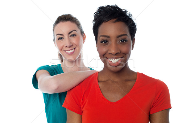 Stock photo: Two friends posing casually