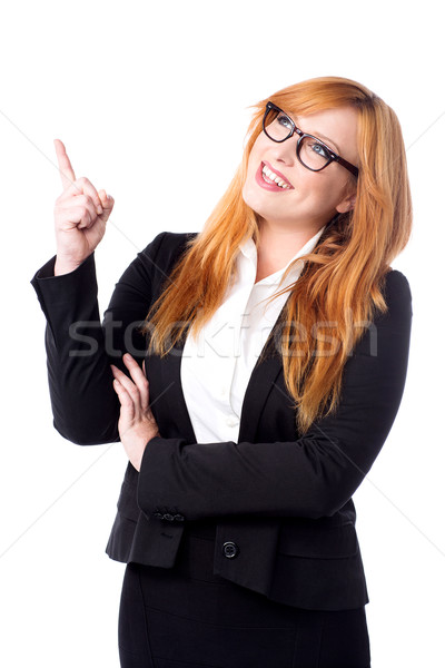 Sorridente empresária indicação jovem corporativo senhora Foto stock © stockyimages