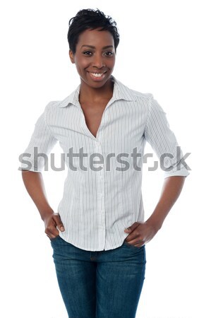 Smiling middle aged woman posing in style Stock photo © stockyimages