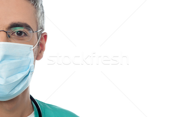 Férfi orvos arc maszk kép orvos műtősmaszk Stock fotó © stockyimages