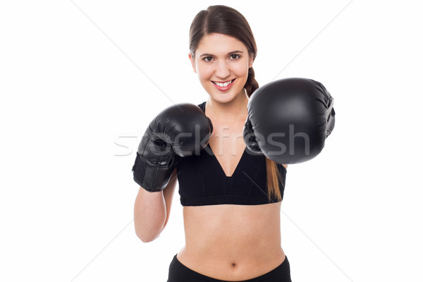 Female boxer ready to punch you Stock photo © stockyimages