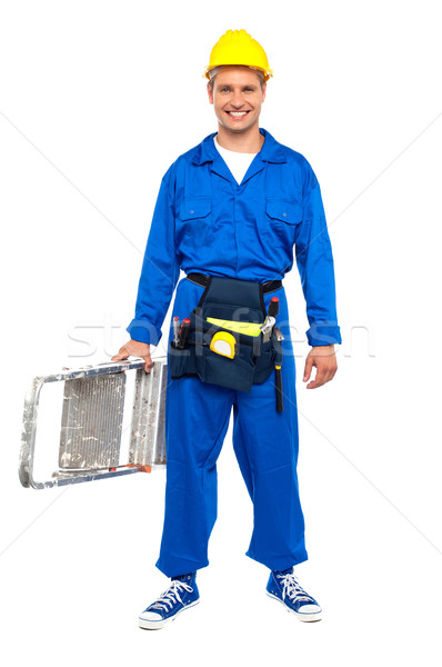 Construction worker ready with stepladder Stock photo © stockyimages