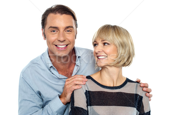Romantic lady admiring her smart looking husband Stock photo © stockyimages
