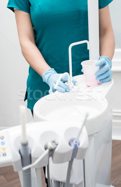 Afundar dental clínica imagem moderno mulher Foto stock © stockyimages