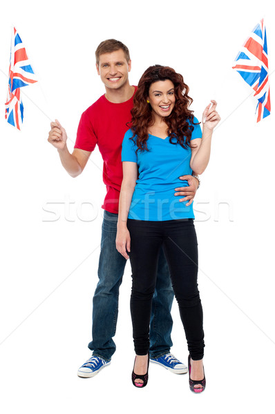 Cheerful UK supporters posing together Stock photo © stockyimages