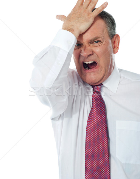 Cropped image of a disturbed businessman Stock photo © stockyimages