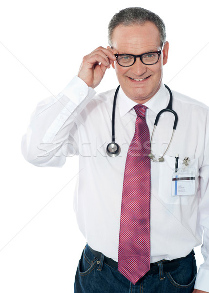 Mature medical professional, indoors studio shot Stock photo © stockyimages