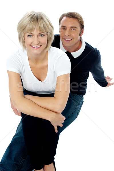 Beautiful lady sitting on his man's lap Stock photo © stockyimages