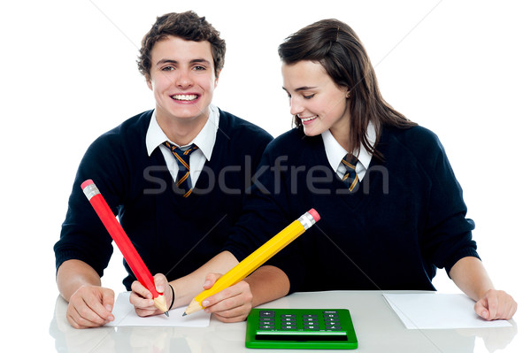 Lány készít partnerek vizsgálat papír fickó Stock fotó © stockyimages