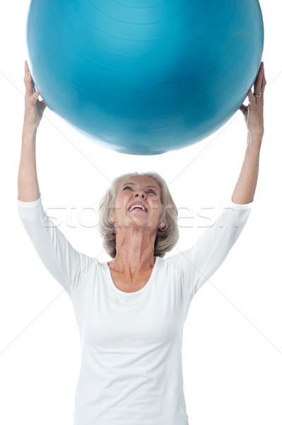 Interessant spielen Senior Frau Ausübung Stock foto © stockyimages