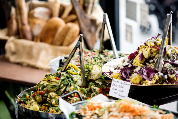 Assorted fresh salads displayed on a buffet Stock photo © stockyimages