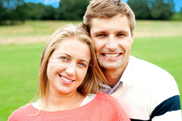 Profile shot of handsome loving couple Stock photo © stockyimages