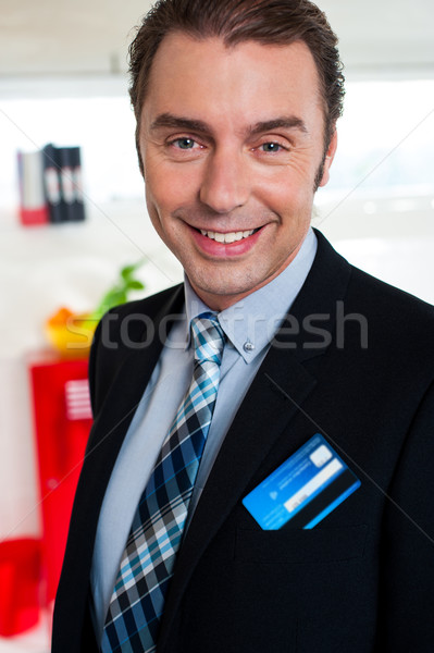 Derűs férfi üzlet igazgató pénz kártya Stock fotó © stockyimages
