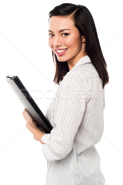 Female assistant holding business files Stock photo © stockyimages