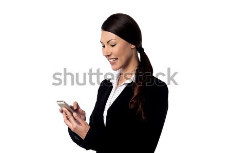 Sonriendo mujer de negocios teléfono móvil feliz teléfono celular Foto stock © stockyimages