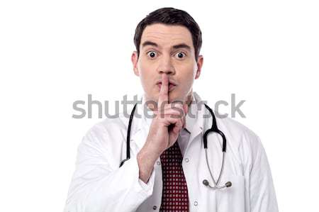 沉默 嚴重 男醫生 男子 簽署 白 商業照片 © stockyimages