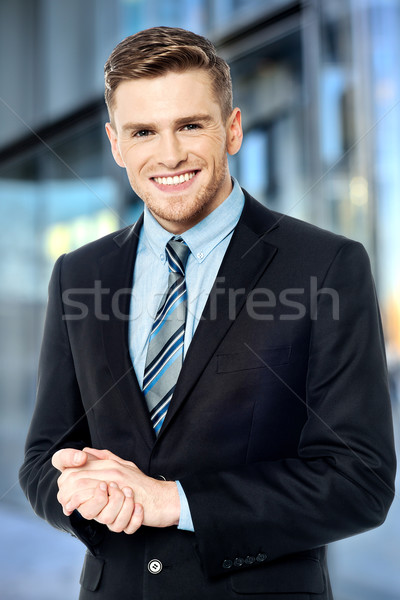 Sorridente empresário posando corporativo cara negócio Foto stock © stockyimages