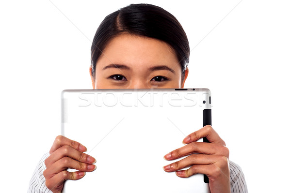 Félénk vállalati hölgy rejtőzködik arc mosolyog Stock fotó © stockyimages