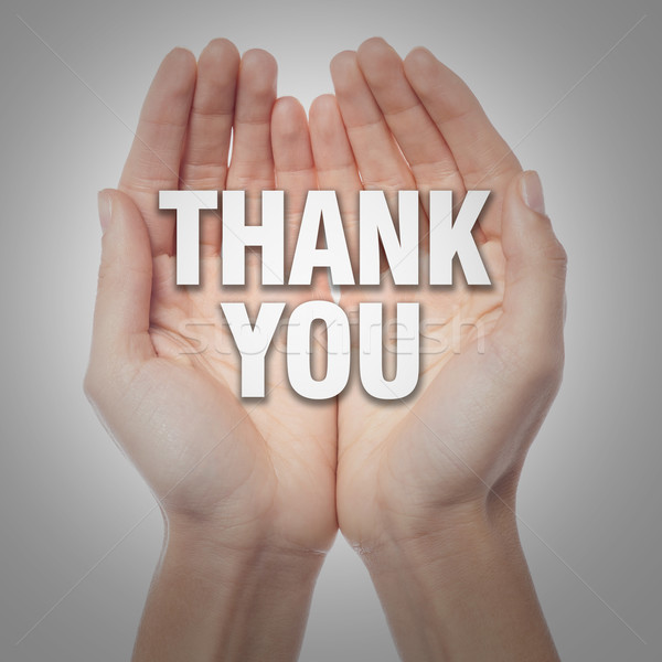 Open palms with word thank you Stock photo © stockyimages
