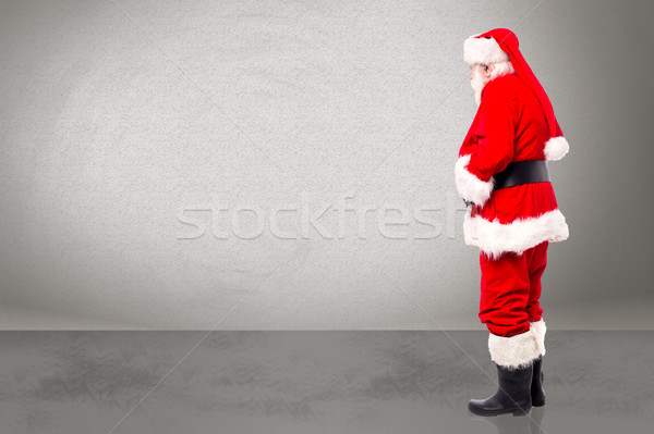 Side view santa claus standing   Stock photo © stockyimages