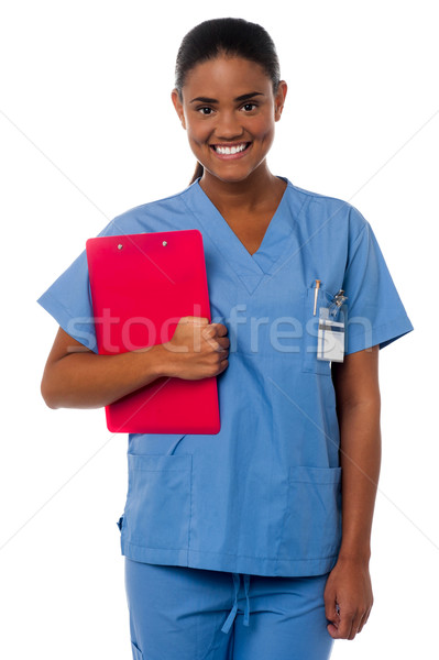 Attivo femminile infermiera appunti dovere Foto d'archivio © stockyimages
