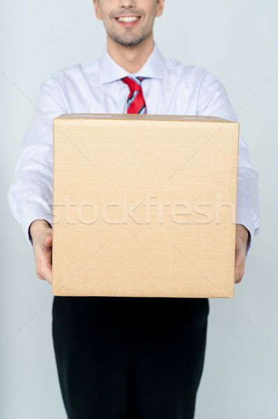 Delivery man with box Stock photo © stockyimages