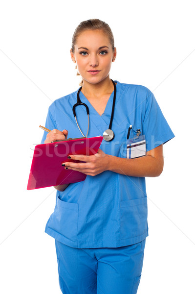 Médico profissional escrita caso história feminino Foto stock © stockyimages