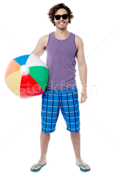 Derűs fickó kész játék strandlabda boldog Stock fotó © stockyimages