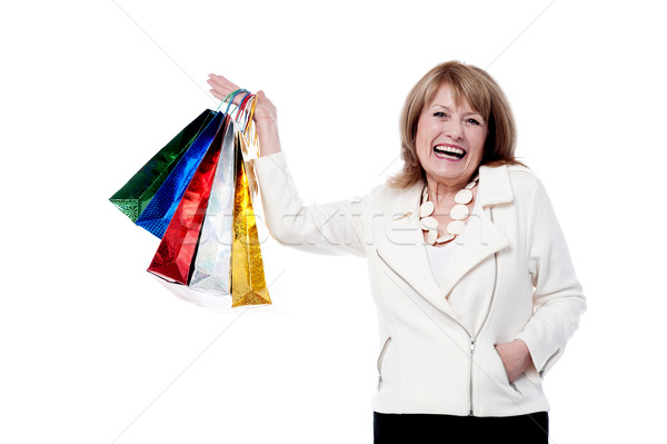 Stock fotó: érett · nő · bevásárlótáskák · idős · nő · felemelt · kezek · színes