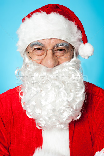 Profile shot of smiling Father Santa Stock photo © stockyimages