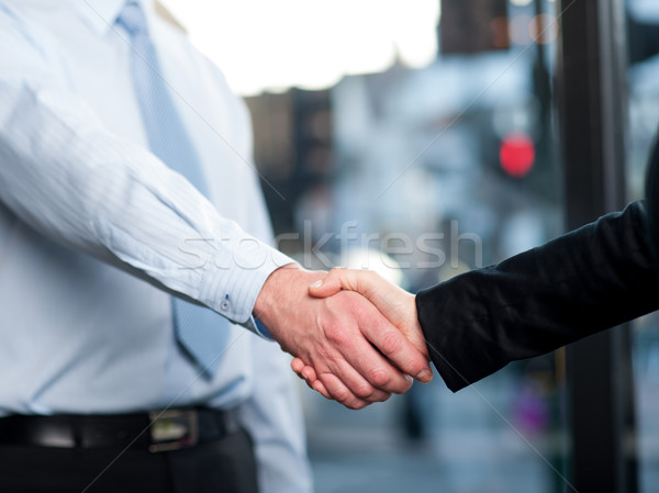 Close-up of business people handshaking Stock photo © stockyimages