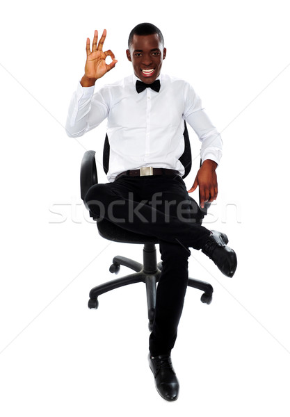 African corporate man showing okay gesture Stock photo © stockyimages