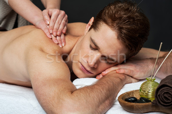 Férfi megnyugtató masszázs fürdő jól kinéző hát Stock fotó © stockyimages