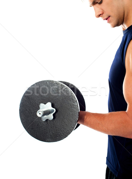 Cropped image of a bodybuilder doing exercise Stock photo © stockyimages
