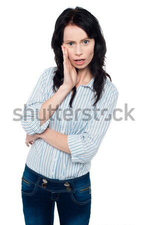 Amazed young woman Stock photo © stockyimages