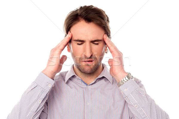Man having severe headache Stock photo © stockyimages